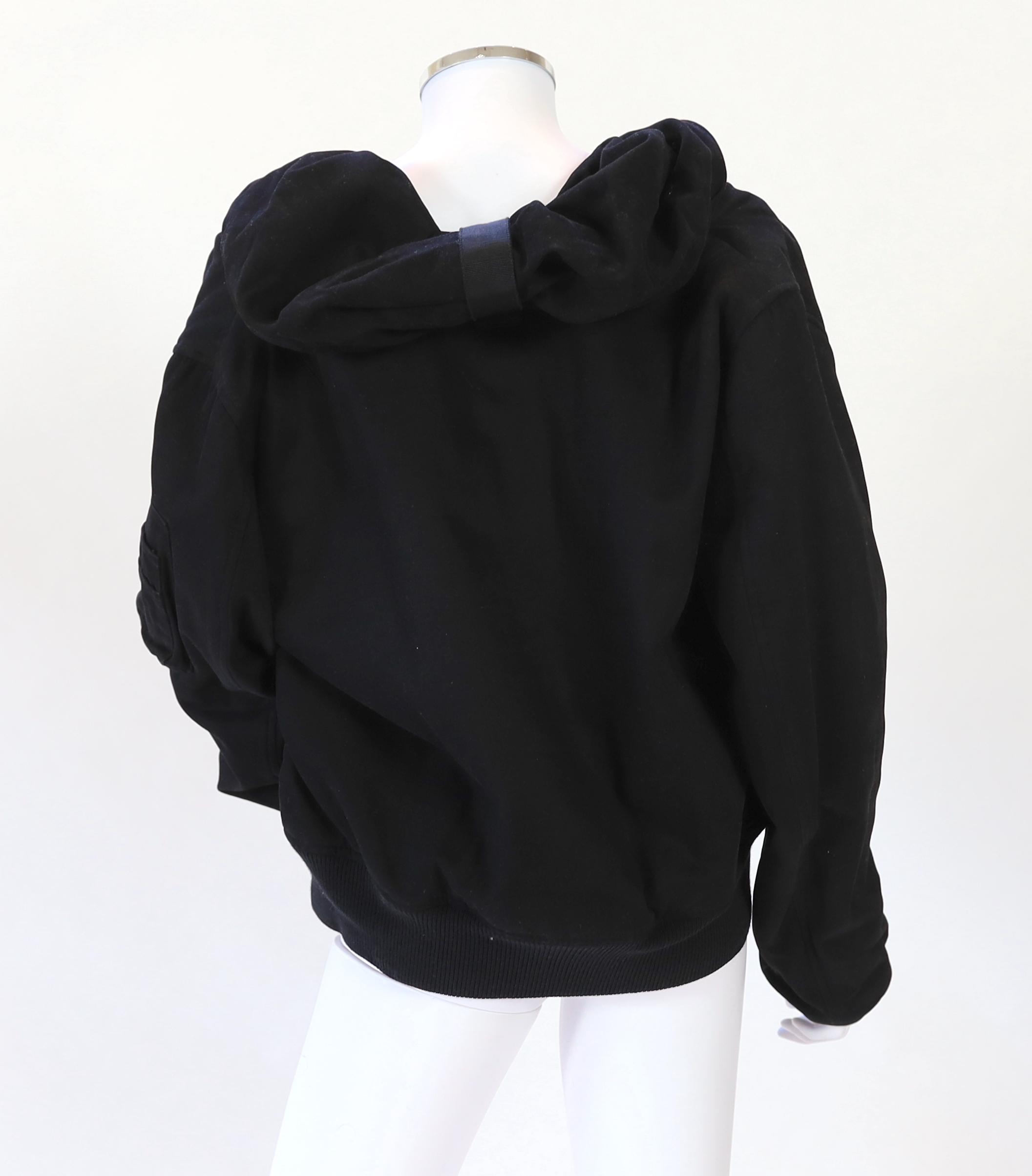 A vintage Yves Saint Laurent lady's hooded black double zipped bomber jacket, size 10-12